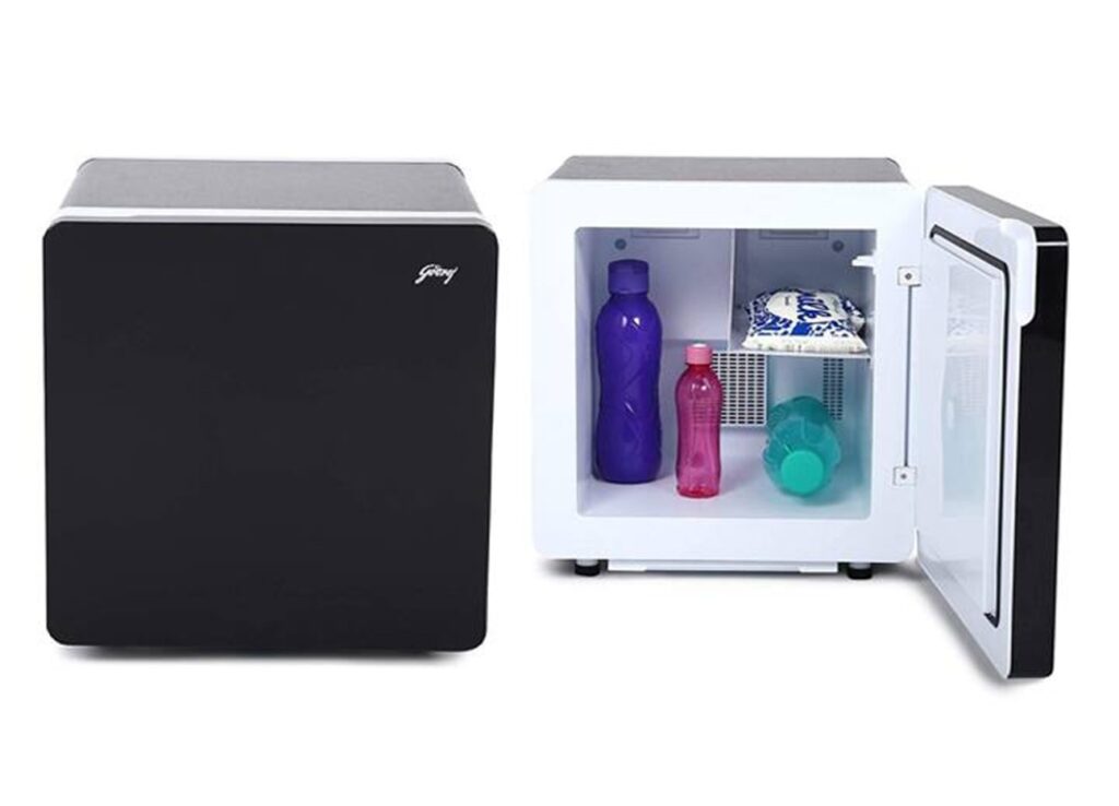 Sleek GIRET Minibar Fridge for Hotel Room Essentials 2025, offering luxury refreshments in resorts and offices.